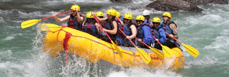 people with helmat rafting